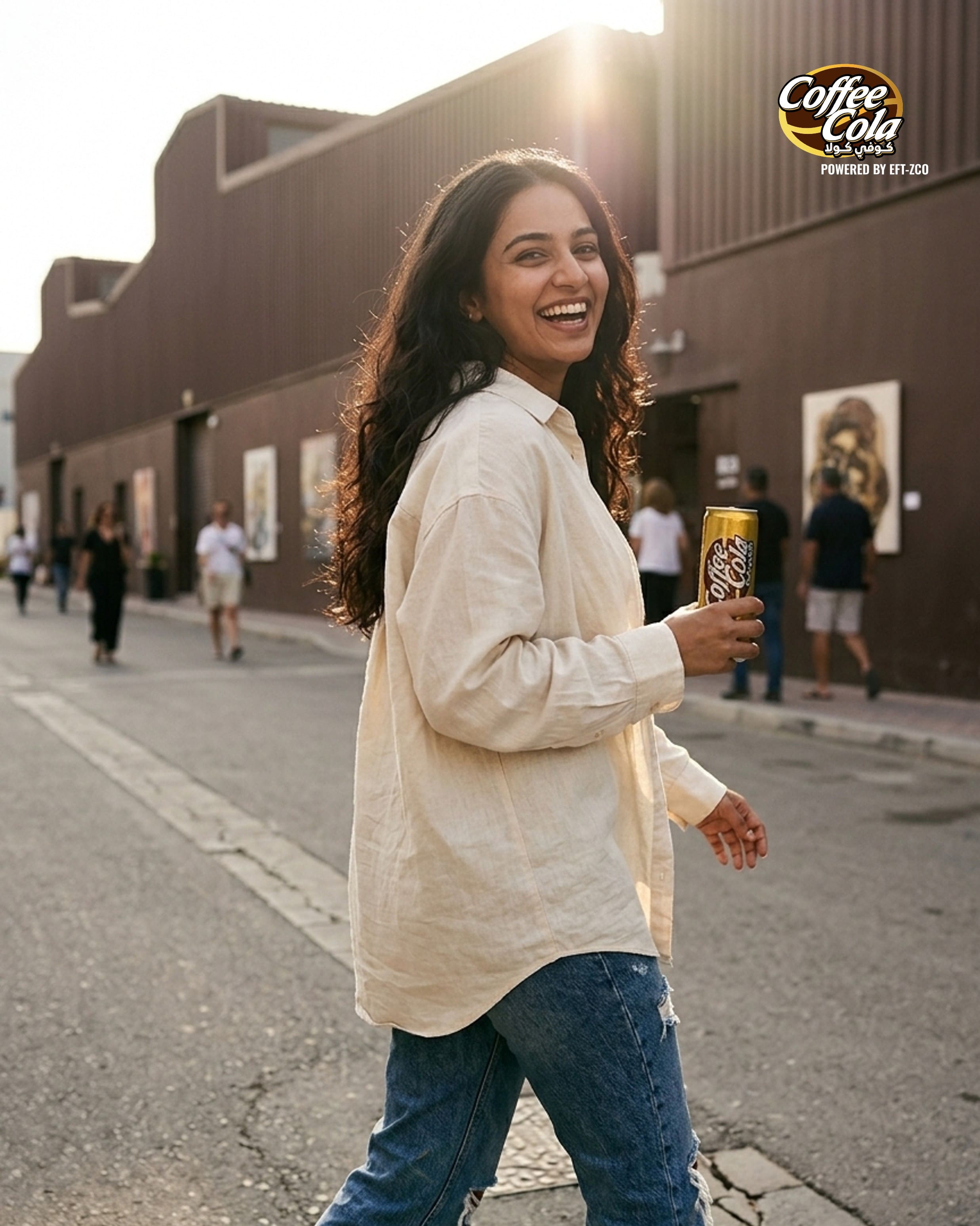 Girl strolling an art street with a Coffee Cola can